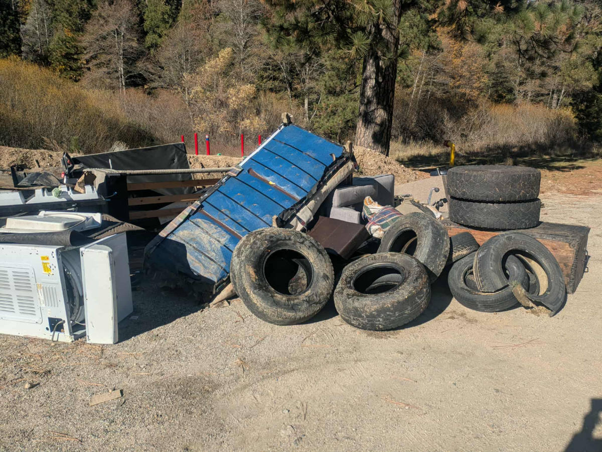 Residential junk pile before removal — Lake Arrowhead, CA